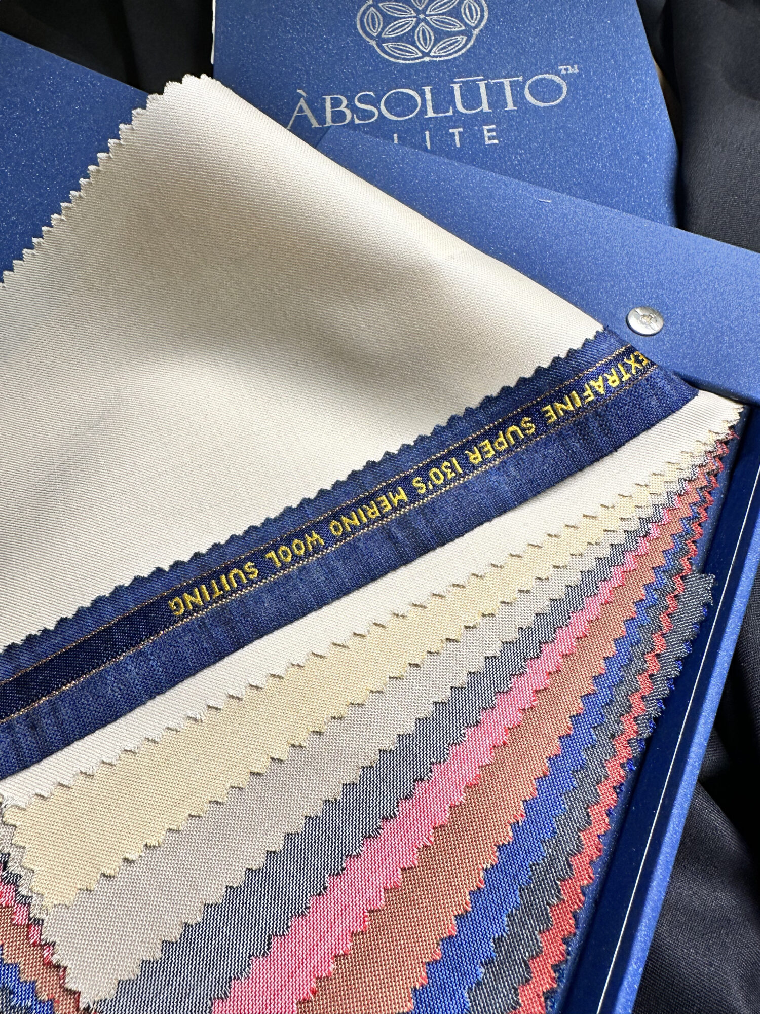 Absoluto Eliite - Super 130's Plain Twills+ Checks - 65% Super 130's Wool 35% Poly